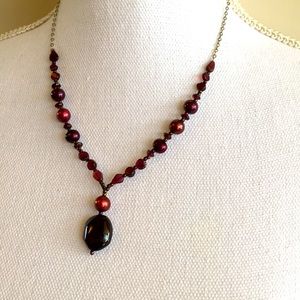 Garnet and burgundy colored pearl beaded Pendant
